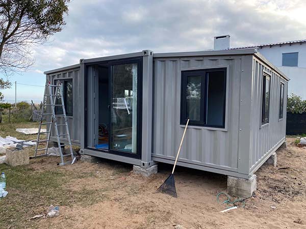 Hurricane-Resistant Expandable Shipping Container House