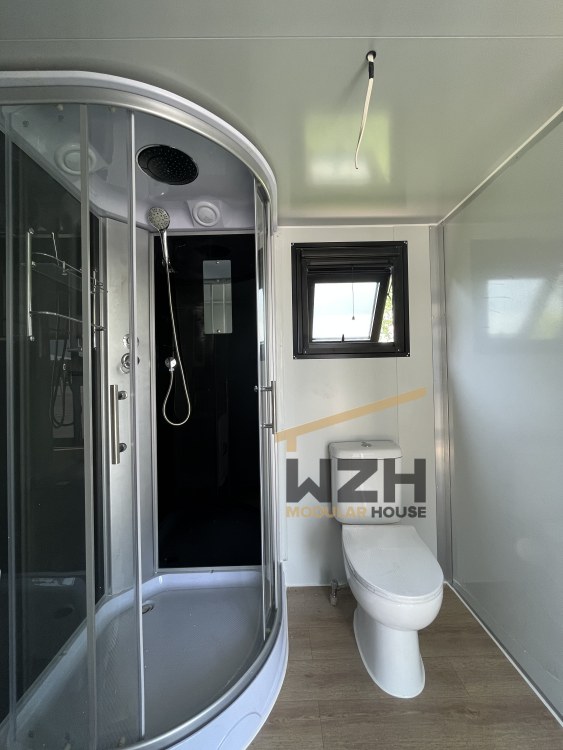 Slide-Out Container Home Bathroom.jpg Slide-Out Container Home Bathroom.jpg